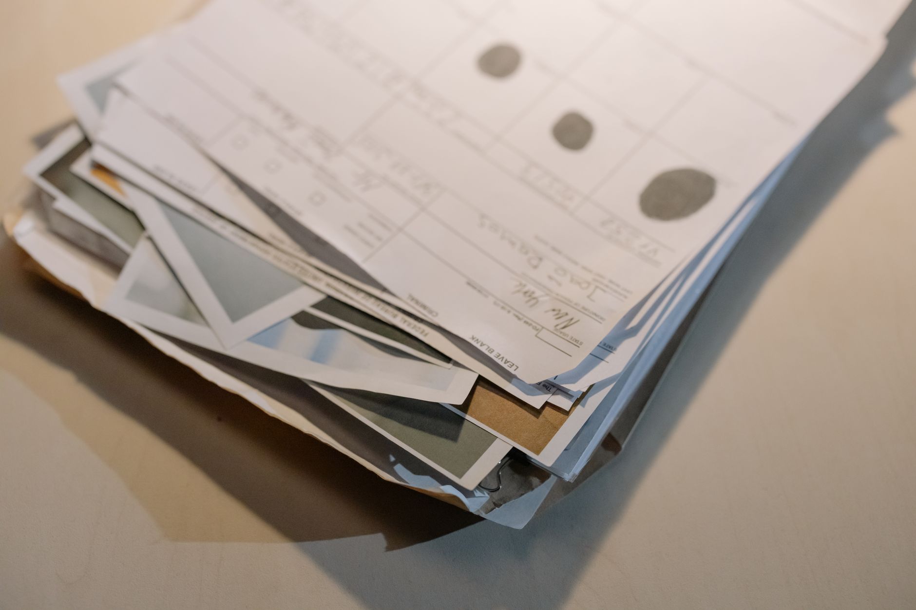 Executive office workspace showing real estate contract files Review