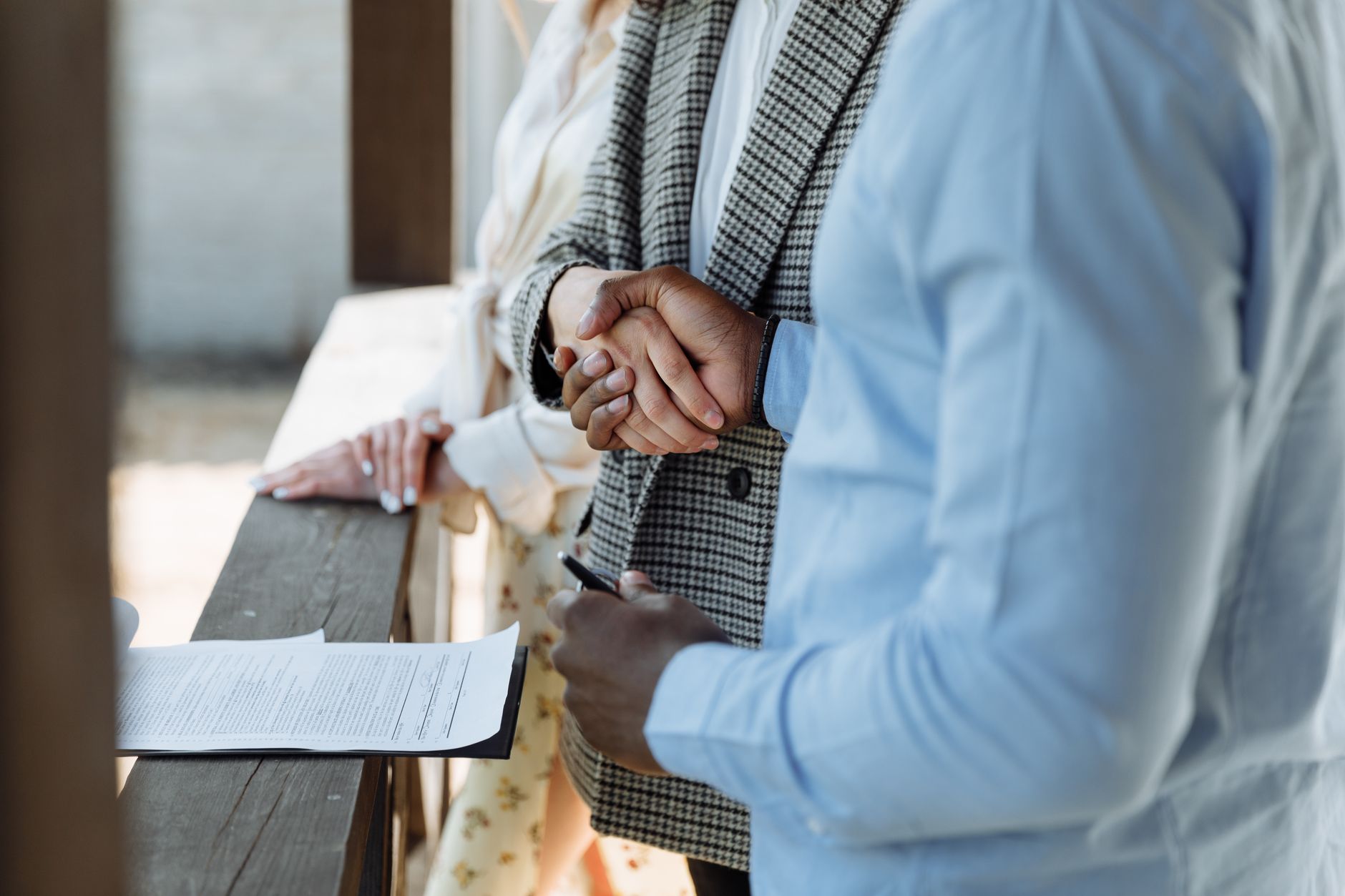 Close up on home buyer signing formal document